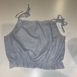 Cute little blue and white top with ties on shoulders